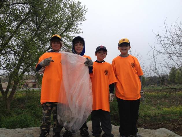 Seekonk Pack 2 Wolf Cubs clean up Martin Elementary school on Earth Day