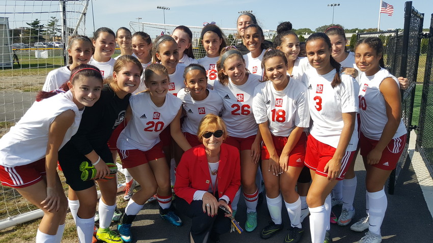 Superintendent of Schools Kathryn Crowley joins the EPHS girls soccer team in a tribute on September 11th.