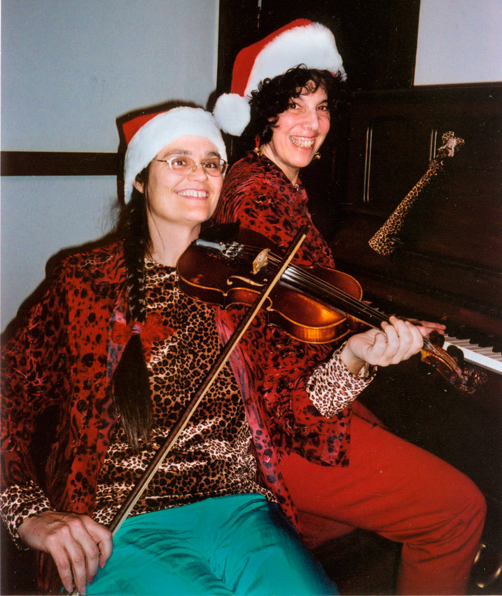Amy Larkin and Roberta Sutter perform at the Rehoboth contra dance on December 29