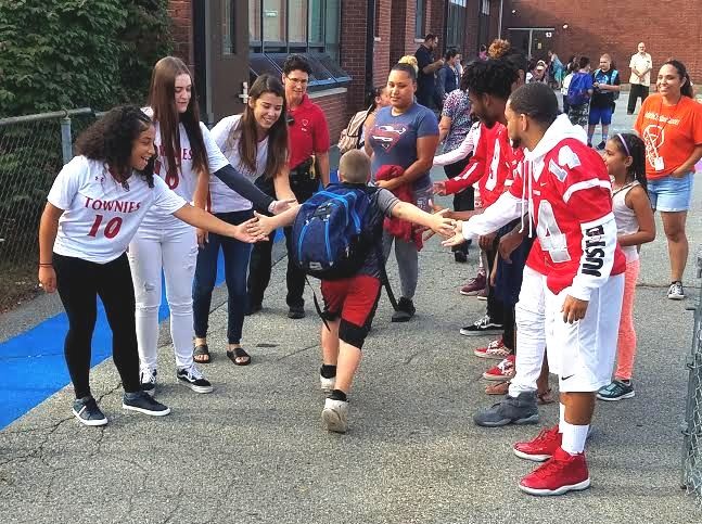Whiteknact school students greeted by EPHS Townies in September.