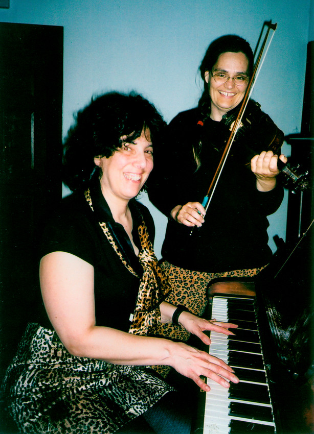 Fiddler Amy Larkin and pianist Roberta Sutter perform at the Rehoboth contra dance on Friday, December 14