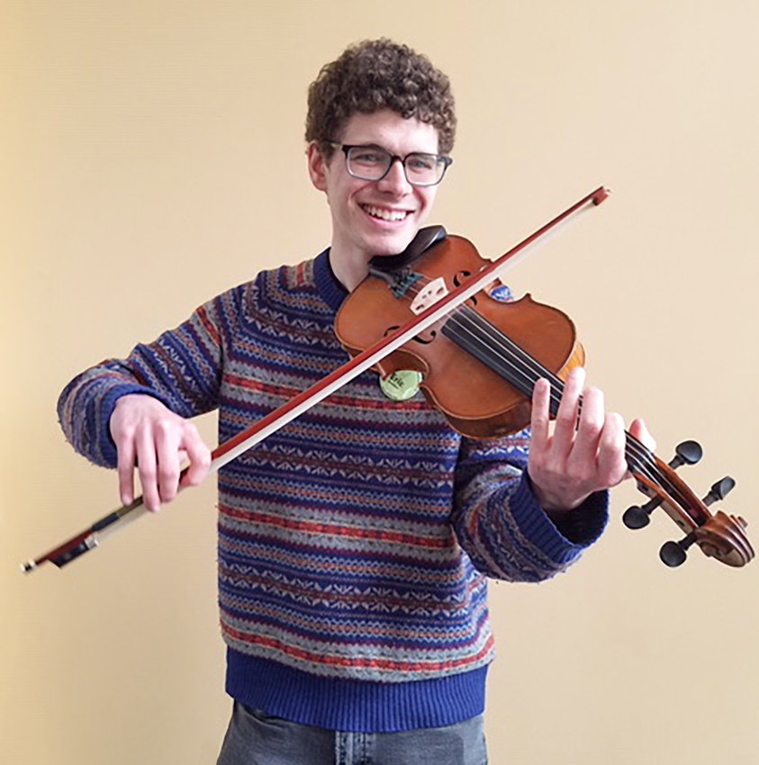 Eric Boodman plays fiddle at the Rehoboth contra dance on Friday, June 14