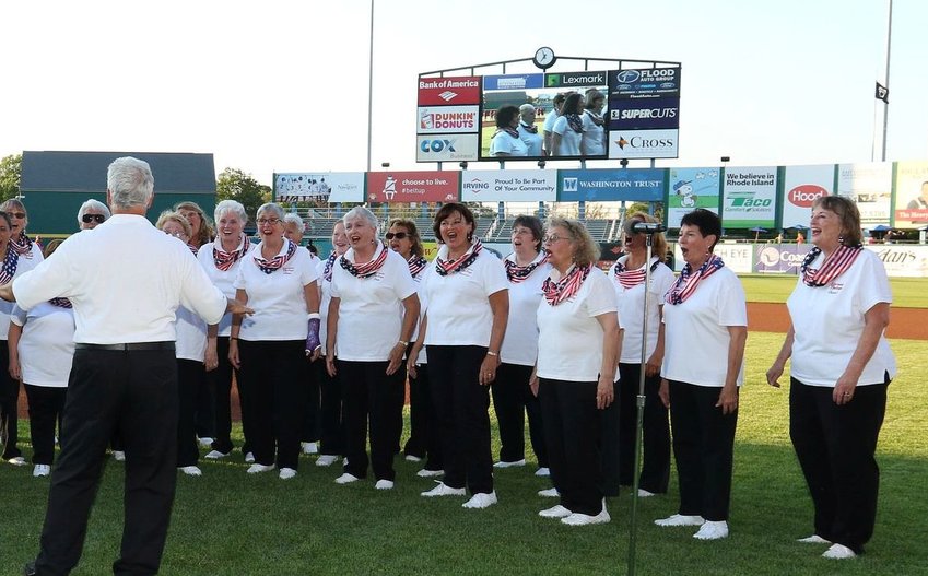 Harmony Heritage, joined by friends and members of NoteAble Blend chorus, sing the National Anthem at McCoy Stadium