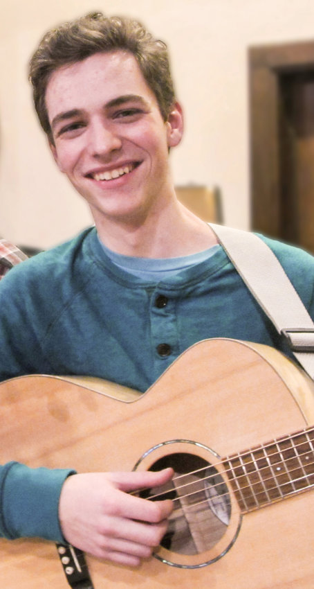 Benjamin Foss performs at the Rehoboth contra dance on Friday, March 13