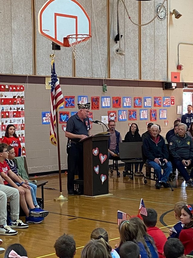 Mr. Jake Kramer, Veterans Agent for the Town of Rehoboth spoke to the audience of staff, students, families, invited guests, and local veterans during Palmer River Elementary School&rsquo;s Veterans Day Tribute.