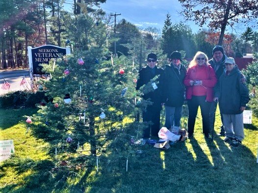 Volunteers decorating the Human Services' Christmas tree at the Seekonk Veteran's Memorial.  Left to right: Ruth, Cheryl, Michelle, Keith, &amp; Beverly