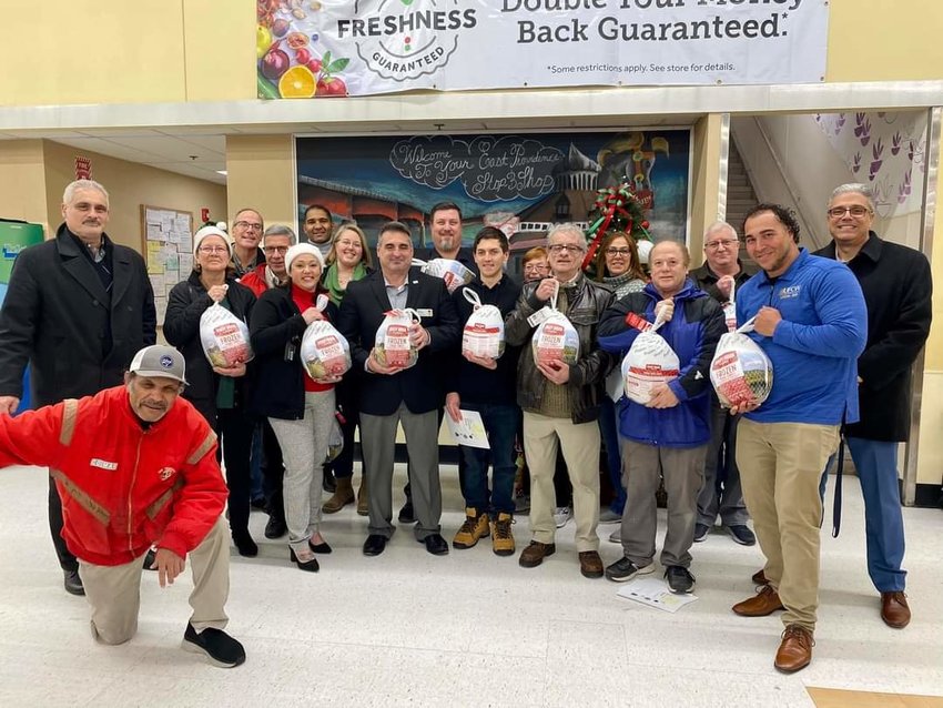Members of the City Committee, Democratic elected officials, Stop &amp; Shop Union members and management representatives gather to collect donated turkeys from Stop &amp; Shop officials.