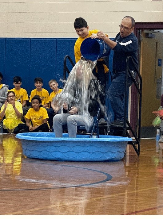Principal Alexis Bouchard was dunked by a student at Hurley Middle School's annual Thanksgiving Dunking Fundraiser on Nov. 23.