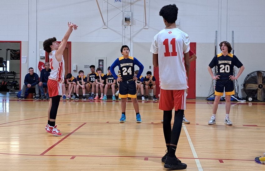 JJ Renaud at the foul line sinking a shot for RMS vs. Barrington