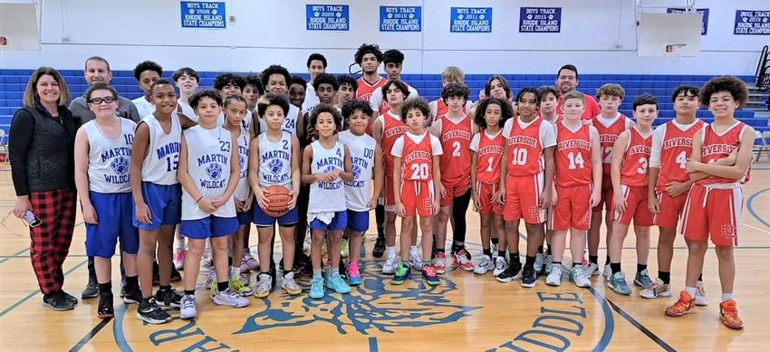 Martin &amp; Riverside MS basketball players unite for a group photo before their game last month at Martin