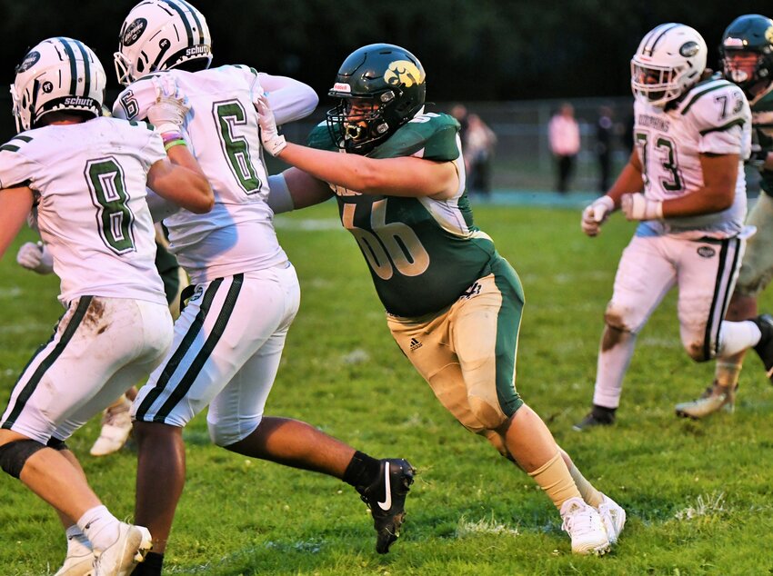 D-R senior captain Luke Peltz making a block vs Dennis Yarmouth earlier in the season will be looking to end his football career with a win vs Seekonk.