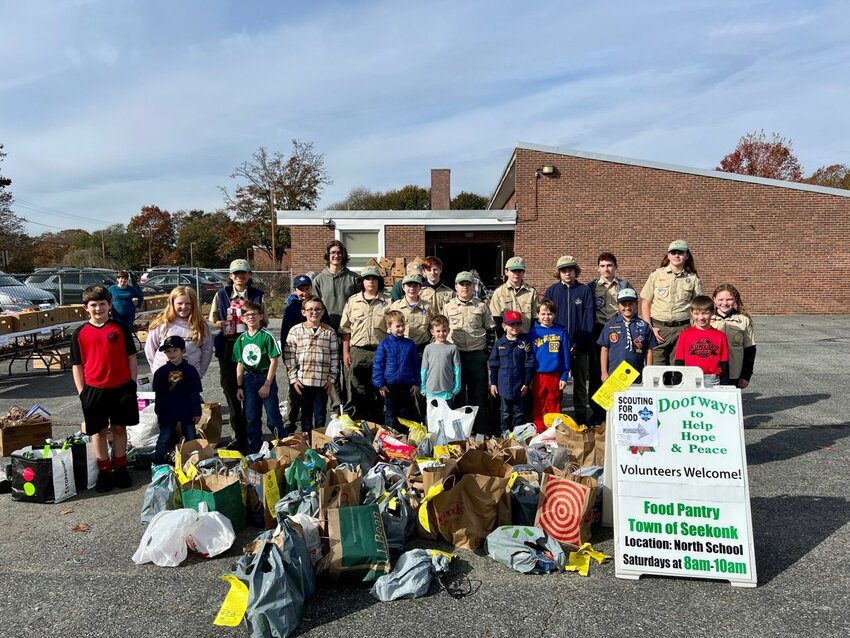 Scouts and parents from BSA Troops 1 &amp; 9, and Cub Scout Pack 88, worked hard to collect over 8,000 pounds of food for Doorways Food Pantry to supplement holiday tables