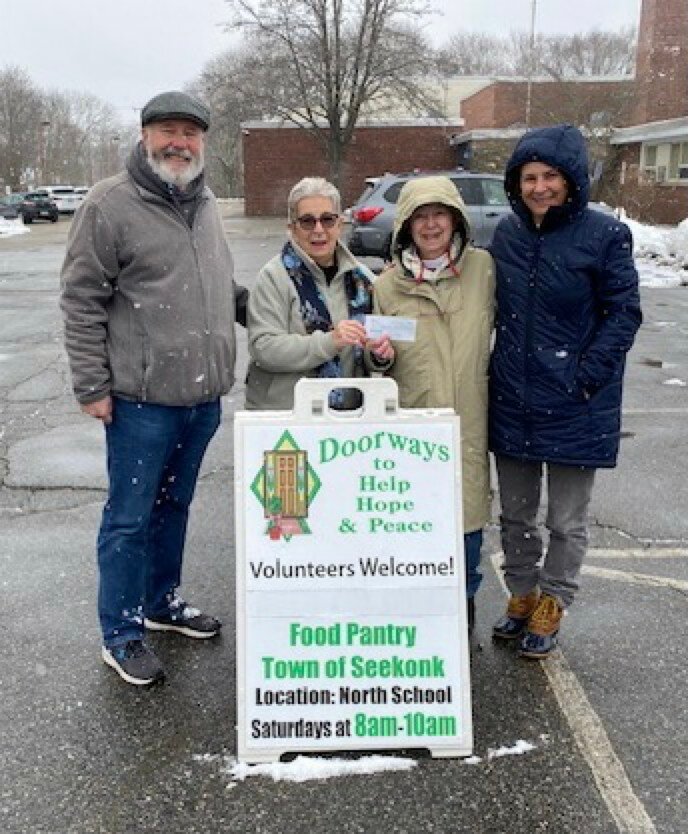 Irene Frechette (second left) of the Seekonk Democratic Town Committee presents a check for $300.00 to Doorways. Pictured here with Irene are Doorways Board members Paul Hodge, Diane Fox and Suzie Miller.