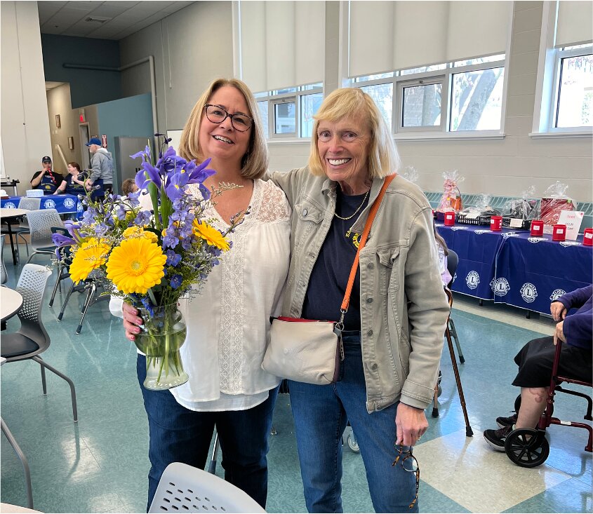- Senior Center Director, Laura Jones (left), pictured with EP Lions President Wendy Wood Hubbard (right).