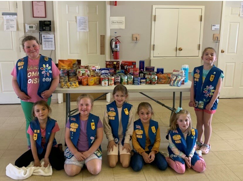 Rehoboth Girl Scout Daisy Troop #507 donated items to the food and pet pantry using some of their cookie profits!