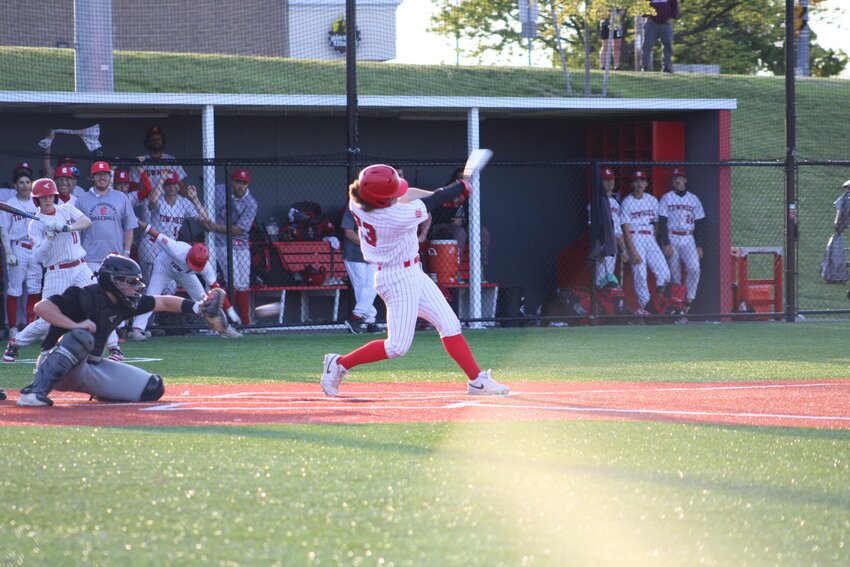 Townie winning pitcher Tyler Dicecco helping with the bat also