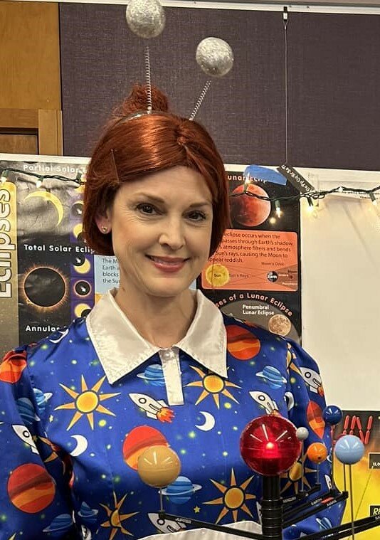 Miss Frizzle visits the Blanding Library on July 8