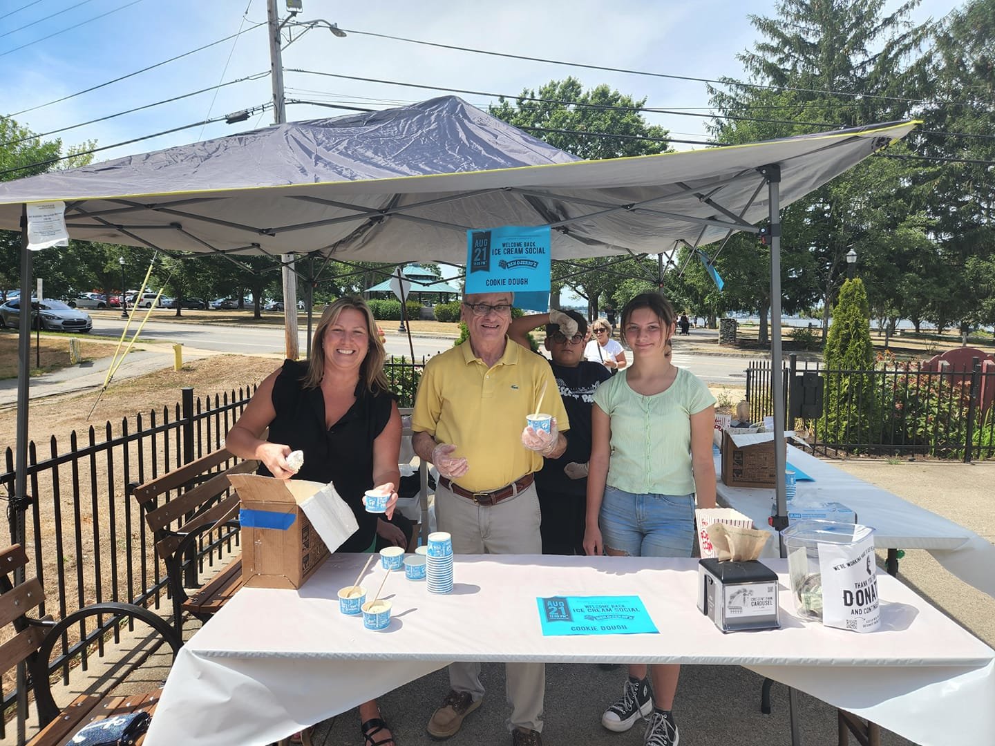 Jessica Beauchaine, Bruce Rogers, Sydney Beauchaine and other volunteers gave free ice cream to over 300 people at the recently opened Crescent Park Carousel in late August.