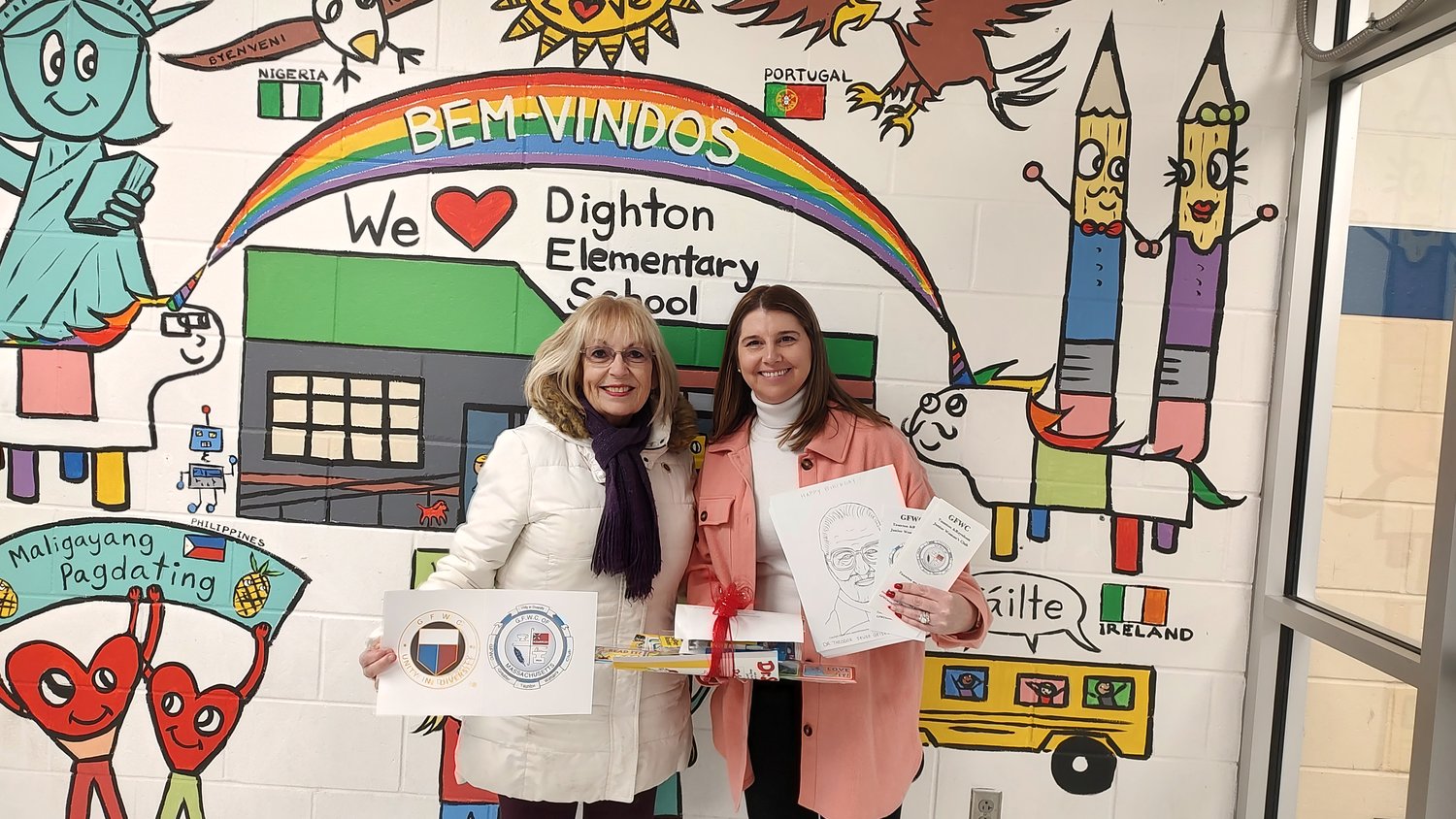 Nancy Brown delivering package to Katelyn Lima, Assistant Principal, Dighton Elementary School.