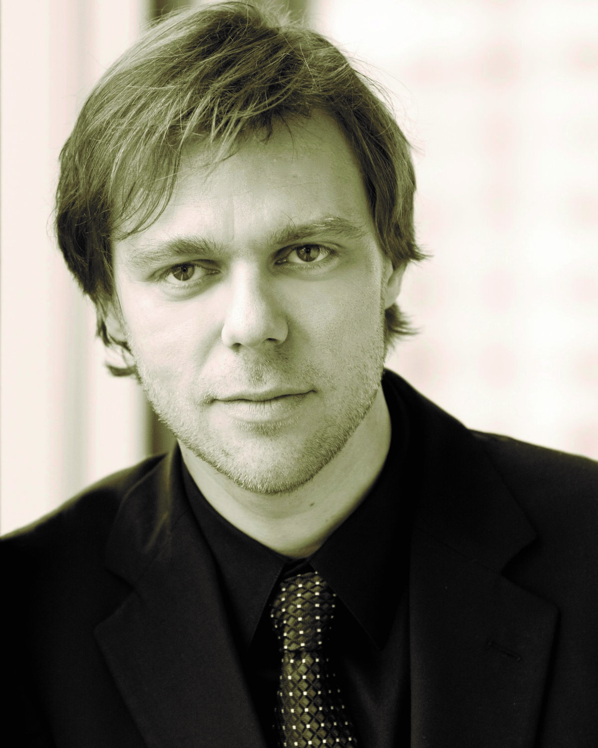 The popular pianist Andrius Zlabys returns to Arts in the Village on Saturday, September 23