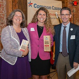 Dawn Euer, left, House Majority Whip Katherine S. Kazarian, center, and Executive Director of Common Cause RI John Marion, right, at the group’s annual celebration and meeting in Pawtucket. Senate photo.