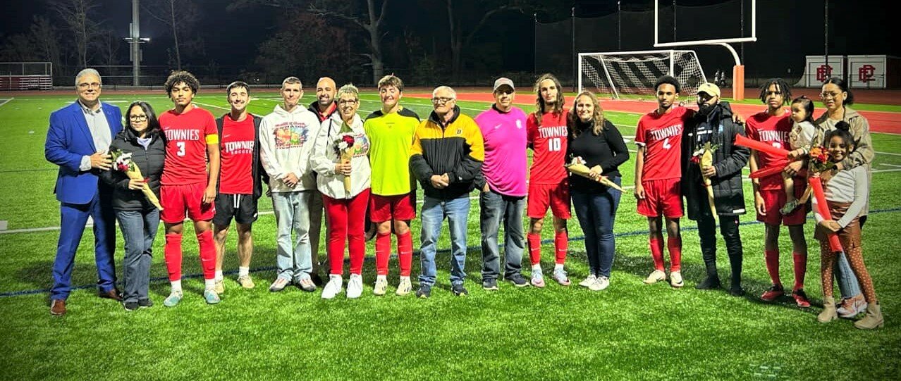 Townie soccer seniors with families on Senior Night. Donna Capelo photo.