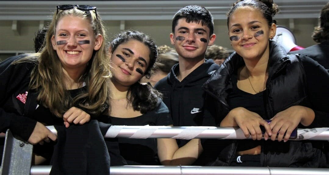 Townie students at Black-Out themed football game. Siena Rietheimer photo.