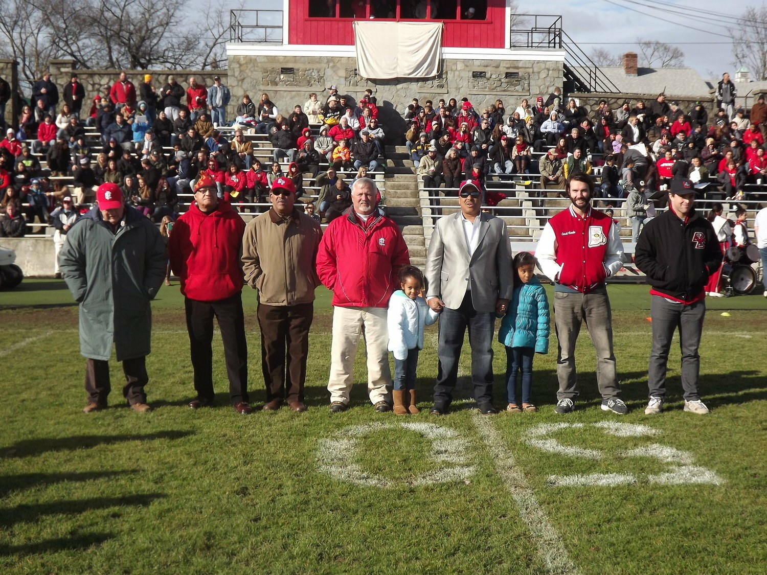 Representing 7 decades of Townie football from the 1940s to 2000s L to R, Bill Stringfellow, Harry Edmonds, Junior Butler, Jim Rose, Matt Lopes, Joe Wahl and Jaime Silva at 2014 game