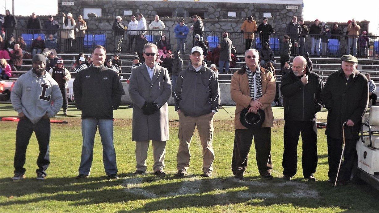 Representing LaSalle legends, 2000s to 1940s, L to R, Lorenzo Perry, Rick Vota, Matt Hannigan, Bill Defley, Al Mello, Dave Sousa and Jim Deffley in 2014