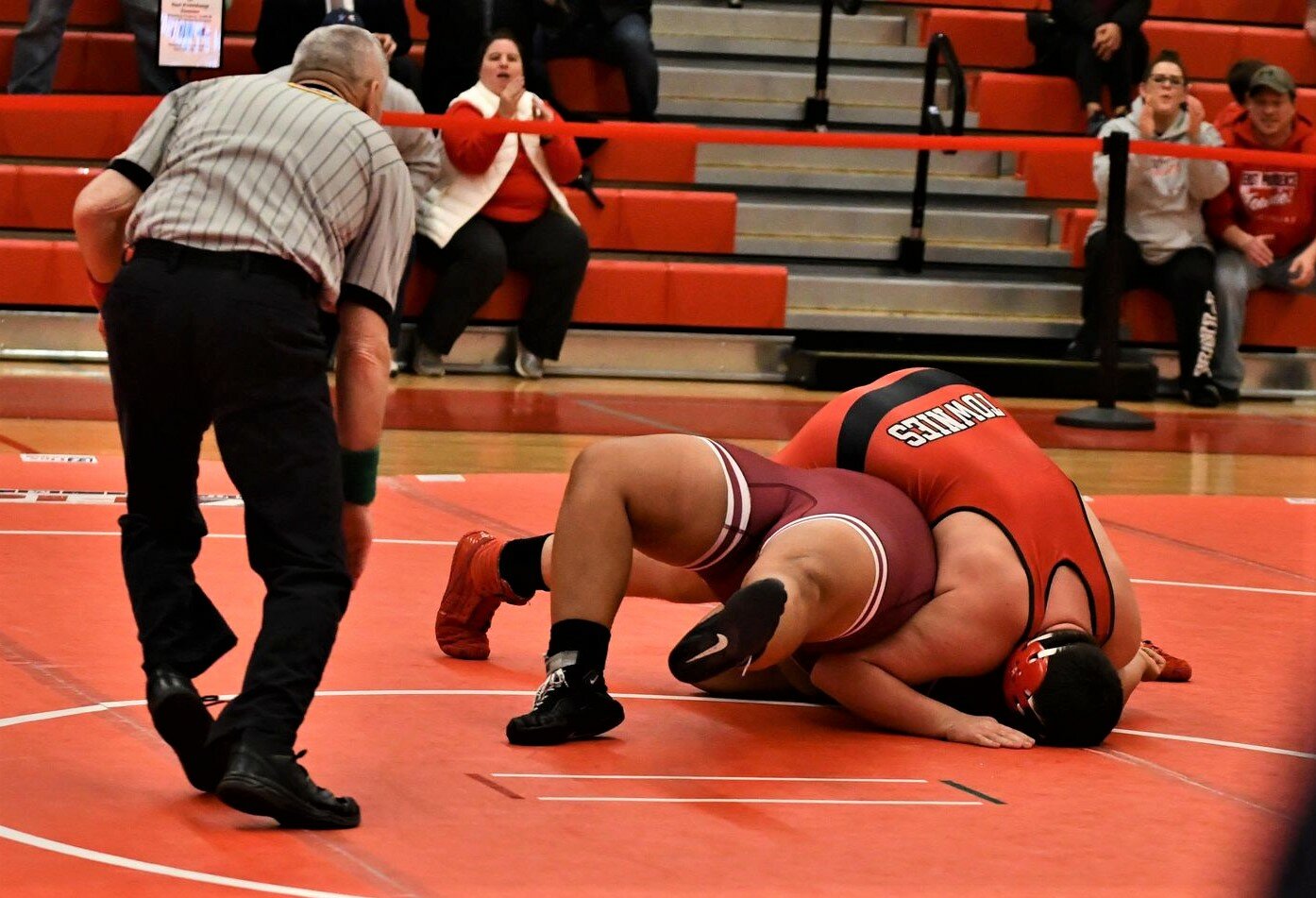 Machar Francis going for the winning pin against La Salle.