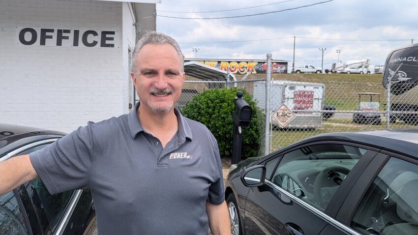 Brian Bossone stands outside the front office of Rockingham Dragway in late April making preparations for POWERfest and the return of "PINKS" in June.