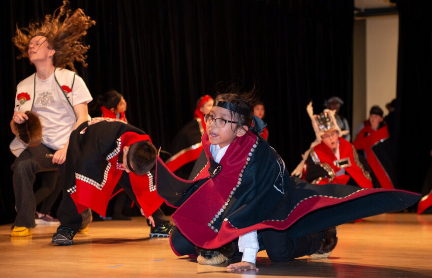 Dancers from Keet Gooshi Heen Elementary School perform on stage at Harrigan Centennial Hall Saturday afternoon during a celebration of the 50th anniversary of the Sitka Native Education Program. Hundreds turned out for the day-long event. (Sentinel Photo by James Poulson)