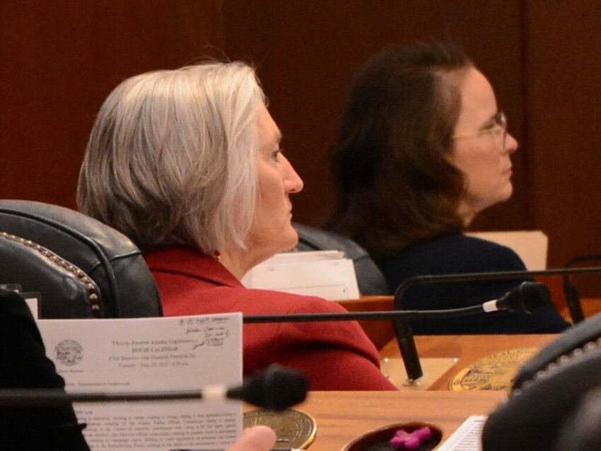Rep. Rebecca Himschoot, I-Sitka and a supporter of HB 57, is seen on Tuesday, May 20, 2025, next to Rep. Sarah Vance, R-Homer, who voted to sustain Gov. Mike Dunleavy's veto of the bill. (Photo by James Brooks/Alaska Beacon)