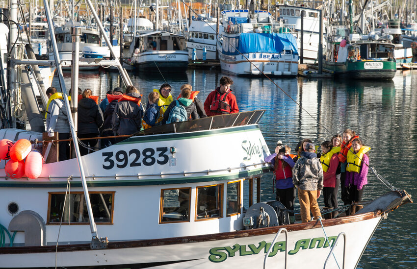 Sitka School District students learn boat safety at an AMSEA safety fair at Crescent Harbor in 2019.