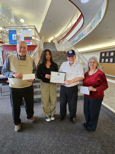 Pioneers of Alaska of Sitka Igloos 12 and 22 provided a $500 scholarship award to Sitka High School graduate Fiona A. Caalim on May 15. From left are Pioneers of Alaska Life Member John Stein, Caalim, POA President Joe Murray, and Vice-President Florence Murray. (Photo provided to the Sentinel)