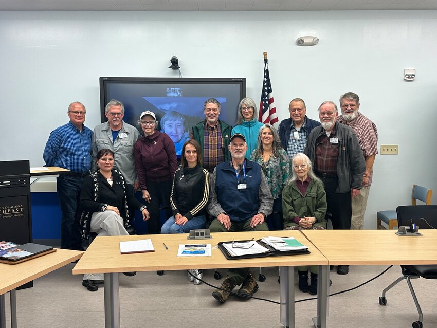 Sitka Rotarians were joined by two Ukrainian Rotarians for a photo following the regular luncheon meeting noon Tuesday at UAS-Sitka, where the two women, Dr. Olhar Paliychuk (front row, left) and Iryna Odyntsova (front row, second from left) from District 2232, were featured speakers. Along the way, the two are sharing the work of Ukraine Rotary clubs and volunteers during the ongoing war between Ukraine and Russia. Rotarians in Ukraine are providing resources, such as books, activities and counseling for children, services to improve sanitation, de-mining work, medical and social work services, and helping refugees. Paliychuk, a gynocologist-oncologist and professor, is the district governor-elect for District 2232; and Odyntsova, an attorney, is the chair of Rotary Fellowship of Educators and club president for RC “Dnipro Novyi” D2232. Top row, from left, are Dan Jones, Jay Stilwell, Shannon Haugland, Kari Lundgren (attending by Zoom), Keith Nyitray, Debbie Miller, John Stein, Dave Lamm and Rich McClear. Front row are Paliychuk and Odyntsova, Ed McFadden, Sharon Bergman and Janet Eddy. (Photo provided)