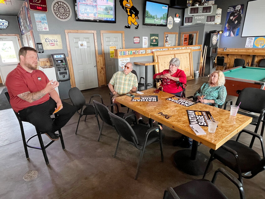 Campaigning for Senate

Nathan Sage of Indianola, left, visited Puff’s White Cap Inn on Sunday afternoon to drum up support in his campaign for the Democratic nomination for the US Senate seat held by Republican Joni Ernst of Red Oak. Sage advertises himself as “working class.”