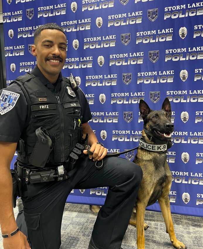 Officer Mitchell Fritz with the Storm Lake police department's newest K-9 officer, Duke.