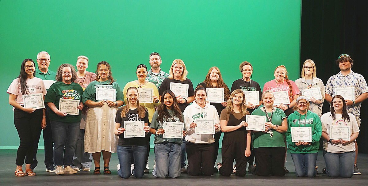 Mike Porsch poses with award winners. Front row from left:  Megan Backman, Yuselin Vazquez, Nichole Krager, Lily Peschau, Sandy Mouw, Kelsie Baccam, Brandie Bushee. Middle: Esmeralda Smith, Susan Slagle-Boyd, Eloise Schumaker , Karina Magana, Holly Husman, Miranda Henkel, Angela Hall, Emma Fuerstenberg, Joanna Freking Smith, Tanner Petersen. Back: Mike Porsch, Rachel Sitzman and Preston Meineke.