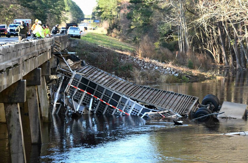Cattle trailer submerged in the Ashepoo River after accident on I95