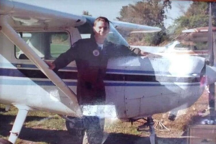 Chris Peterson with the Cessna 152 that he soloed on that day 30 years ago at Hendersonville Airport