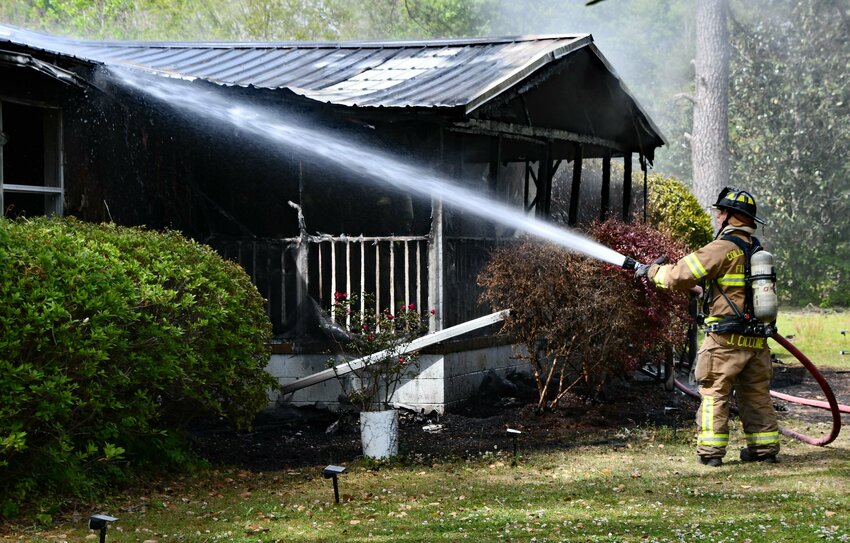 Colleton County Firefighters putting out fire at residence