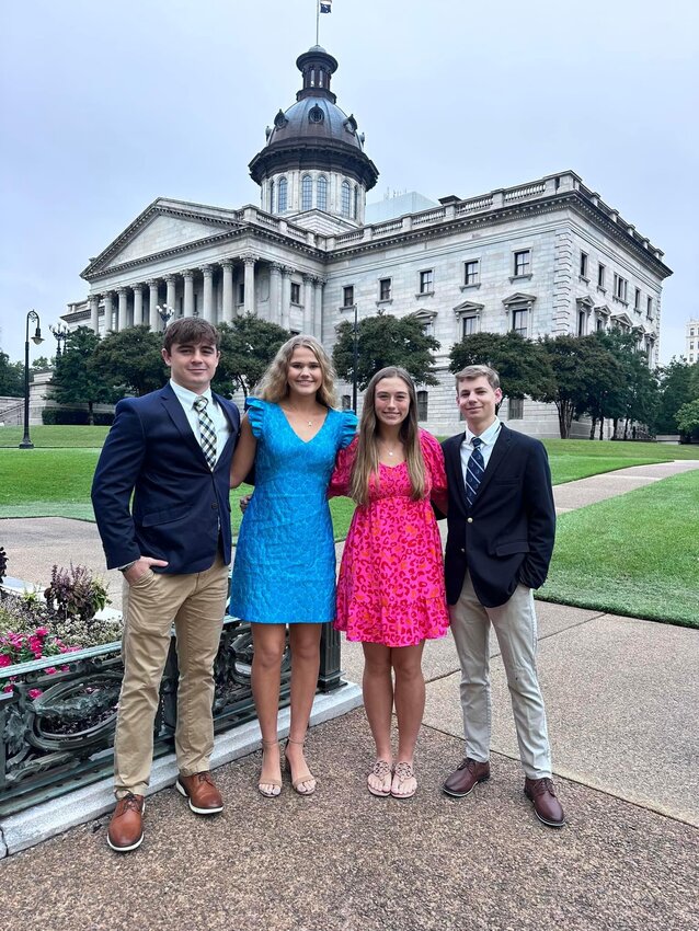 Carter Sims, Anne Hatcher White, Ava Murray, and Blake Spears represented CPA at the SCISSA High School Fall Conference at the South Carolina State House.