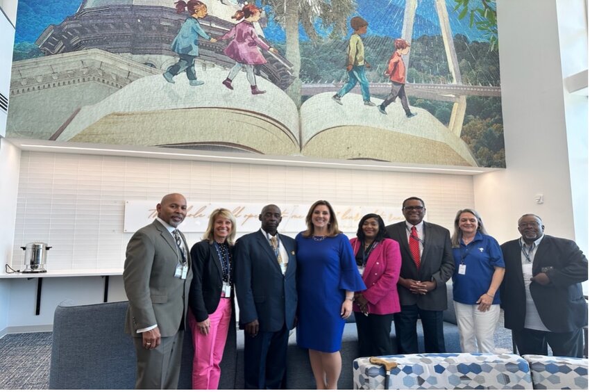 L to R:  G. Nixon, S. Witkin, R. Cunningham, State Superintendent Ellen Weaver, Superintendent Jessica Williams, SCSBA Region 1 representatives, & L. Stroble