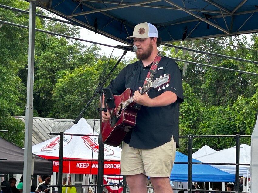 Thomas McMillan entertains local fans at the 50th Rice Festival
