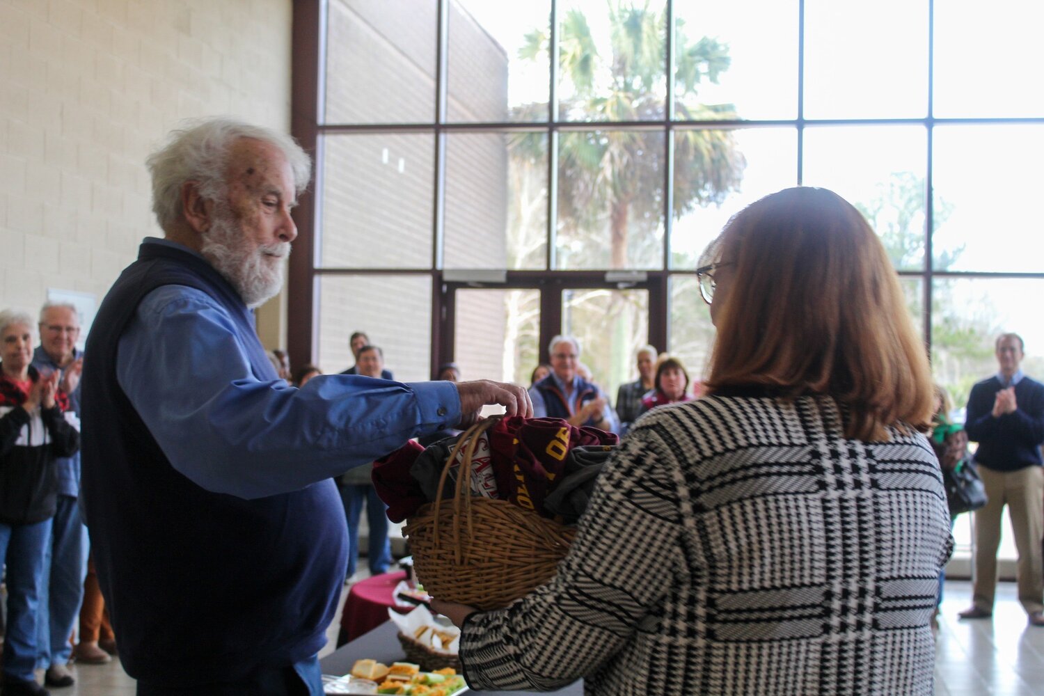 Professor Joe Siren receives a gift to remember the Salkehatchie community.  Siren retired from teaching at USC Salkehatchie after nearly 50 years of service.