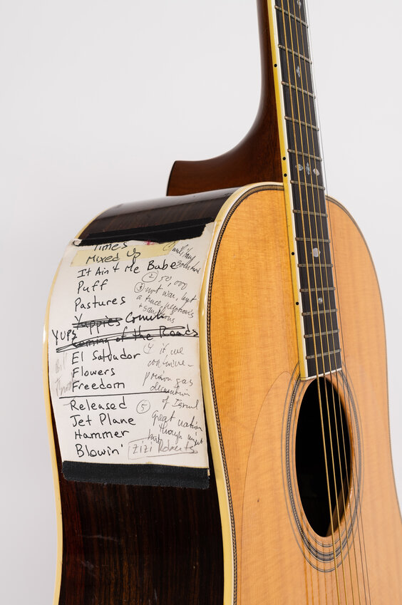 Peter Yarrow’s 12-fret dreadnought guitar to be displayed includes a Peter, Paul & Mary setlist attached to it.