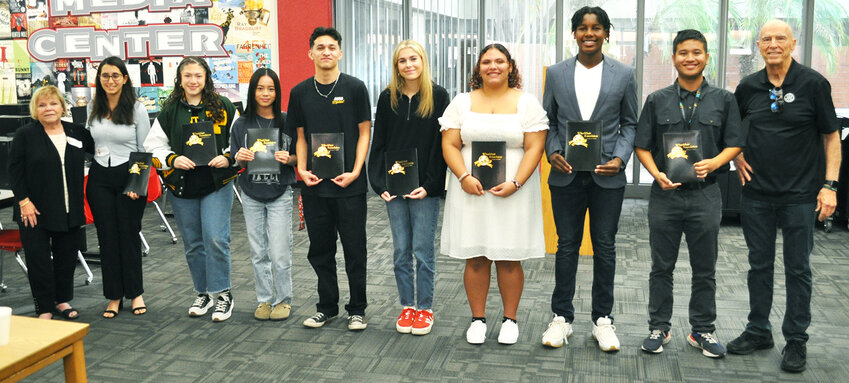 Students from four high schools were honored as Students of the Month. From left, Darlene Eger, club Youth Chair; Maryam Gorgees and Jaydee Gelleos from Peoria High School; Ivy Nguyen and Luis Morales from Peoria Flex HS; Kenzie Frey and Te'Ana Moore from Centennial; Noah Gifft and Kenneth Armstrong from Ironwood; and PNRC member Dave Evans.