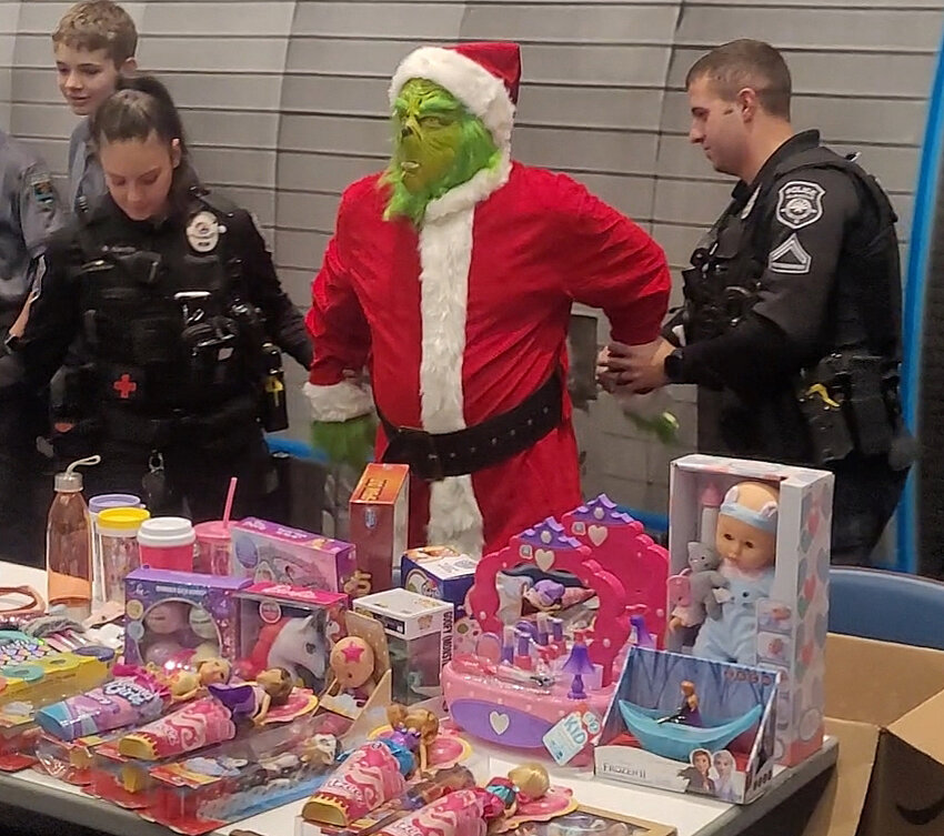 Police arrested The Grinch at the 2022 Cops & Kids in Glendale.
