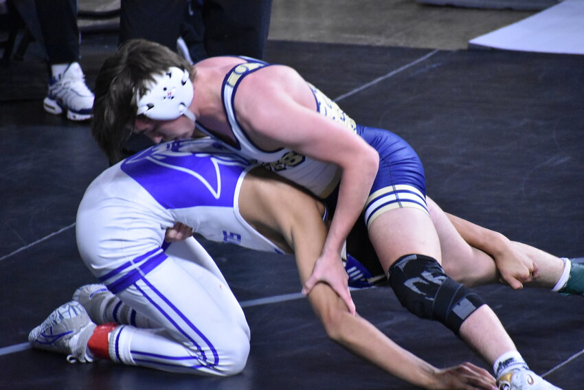 Casteel senior Chase Carter, top, placed fifth at  132 pounds in Division 1 at the state wrestling championships, held at Veterans Coliseum the weekend of Feb. 15-17. 